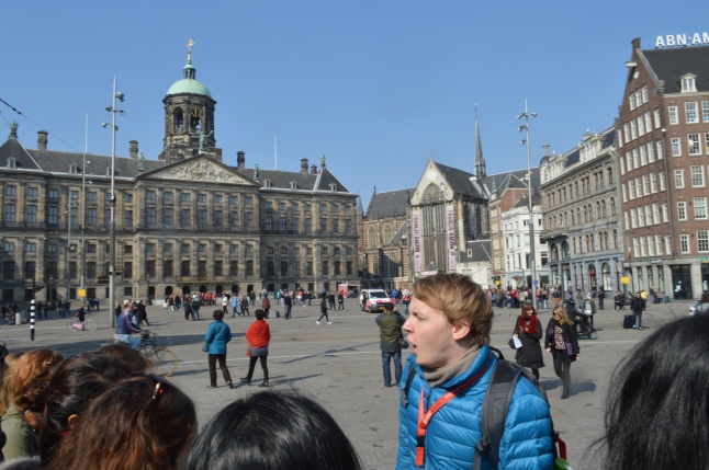 Our tour guide with the group at Dam Square